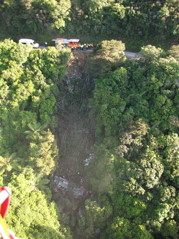 A logging truck rolled approximately 80 metres down a hill